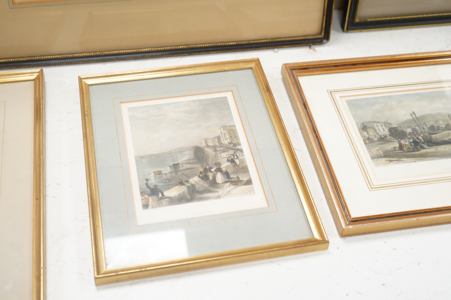 A collection of 19th century and later prints, some Brighton interest to include: Summer's evening at the Royal Marine Library, Brighton, The Lanes and other views of Worthing, Hastings and near Beachy Head, largest 35 x